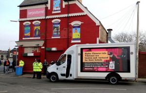 Sunday: Mobile Billboard Calling on Liverpool FC Owner to Drop Controversial Deal With Chinese Company, Tibet Water, to tour the city ahead of Manchester City Match